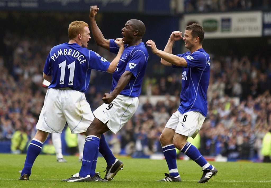 Kevin Campbell of Everton celebrates his goal with team-mates Mark Pembridge (left) and Tomasz Radzinski (right)