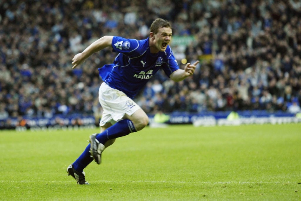 Wayne Rooney of Everton celebrates scoring the winning goal
