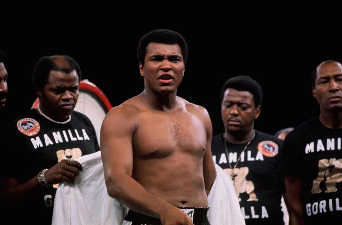 9/27/1975- Manila, Philippines- Muhammad Ali horses around at the weigh in before he fights Joe Frazier.
