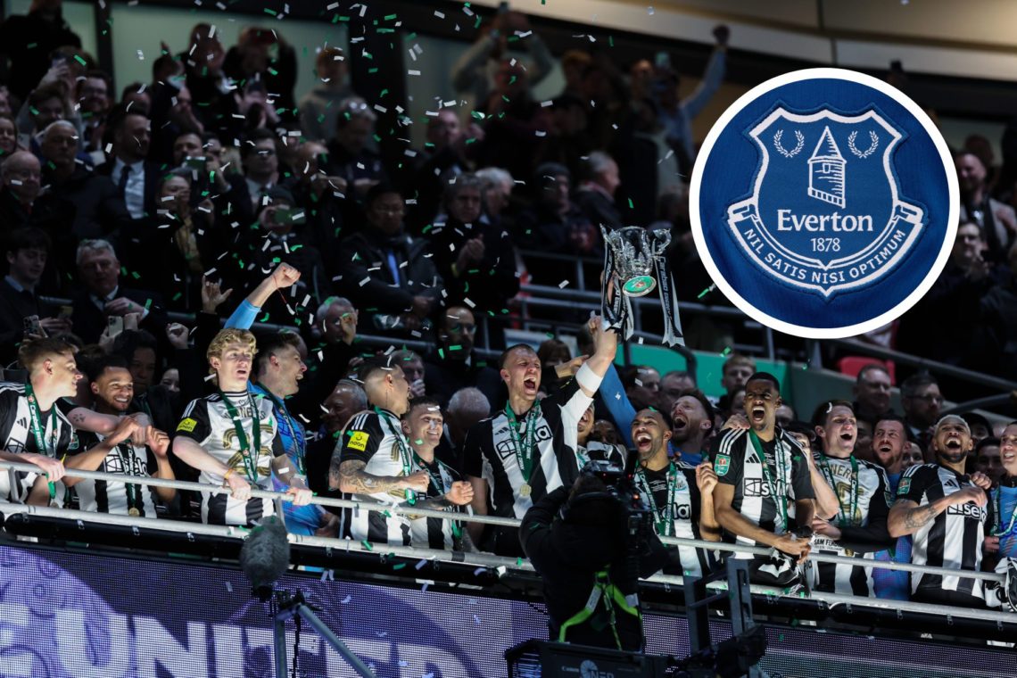 Dan Burn of Newcastle United holds up the winners trophy following the Carabao Cup Final between Liverpool and Newcastle United at Wembley Stadium....