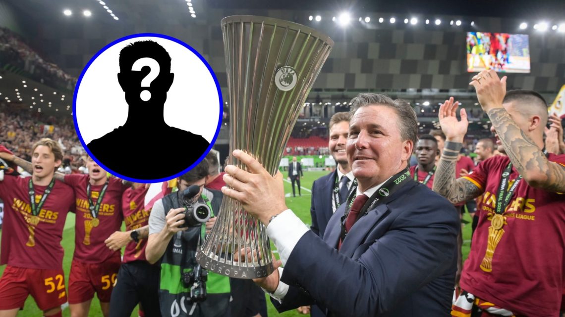 Dan Friedkin lifts the Europa Conference League trophy.