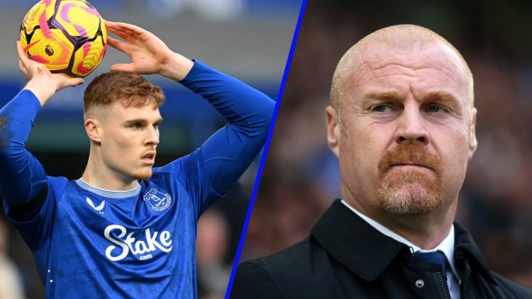 Jake O'Brien throws the ball in a Premier League game for Everton. Sean Dyche watches on from the sidelines as Everton manager.