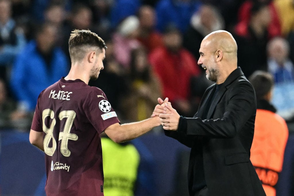James McAtee and Pep Guardiola embracing after Slovan Bratislava vs Manchester City.