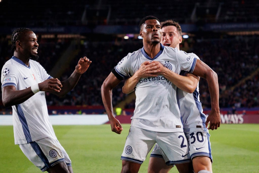 Inter Milan defender Denzel Dumfries celebrates.