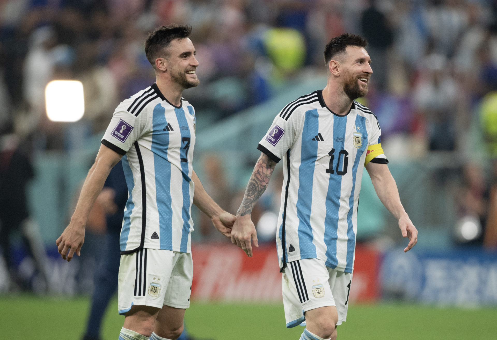 Lionel Messi and Nicolas Tagliafico of Argentina celebrate after the FIFA World Cup Qatar 2022.