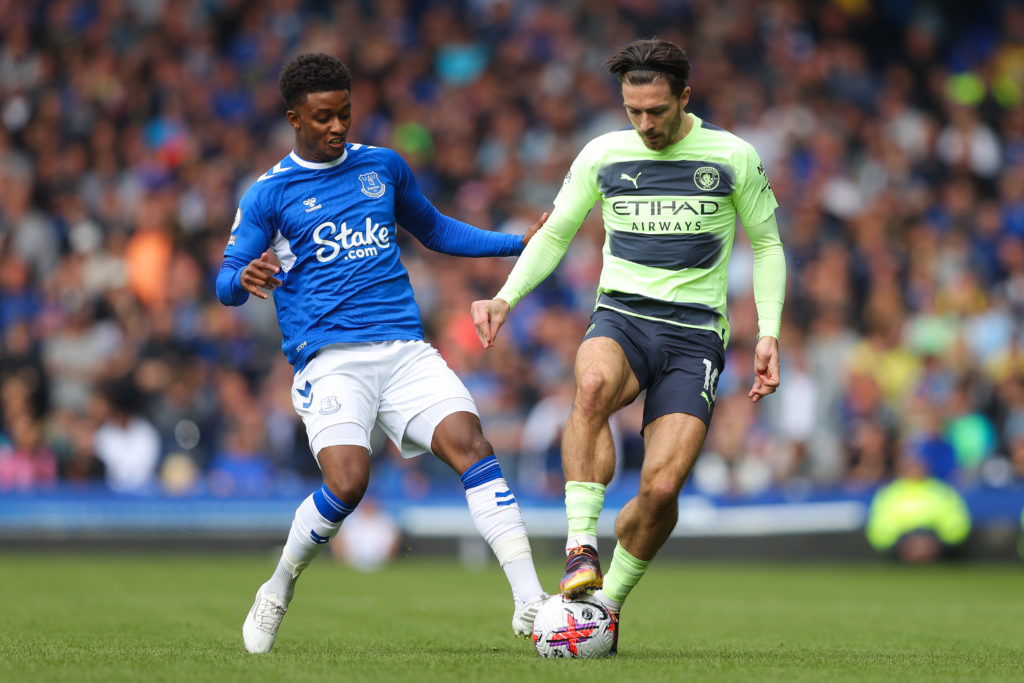 Jack Grealish playing for Manchester City against Everton.