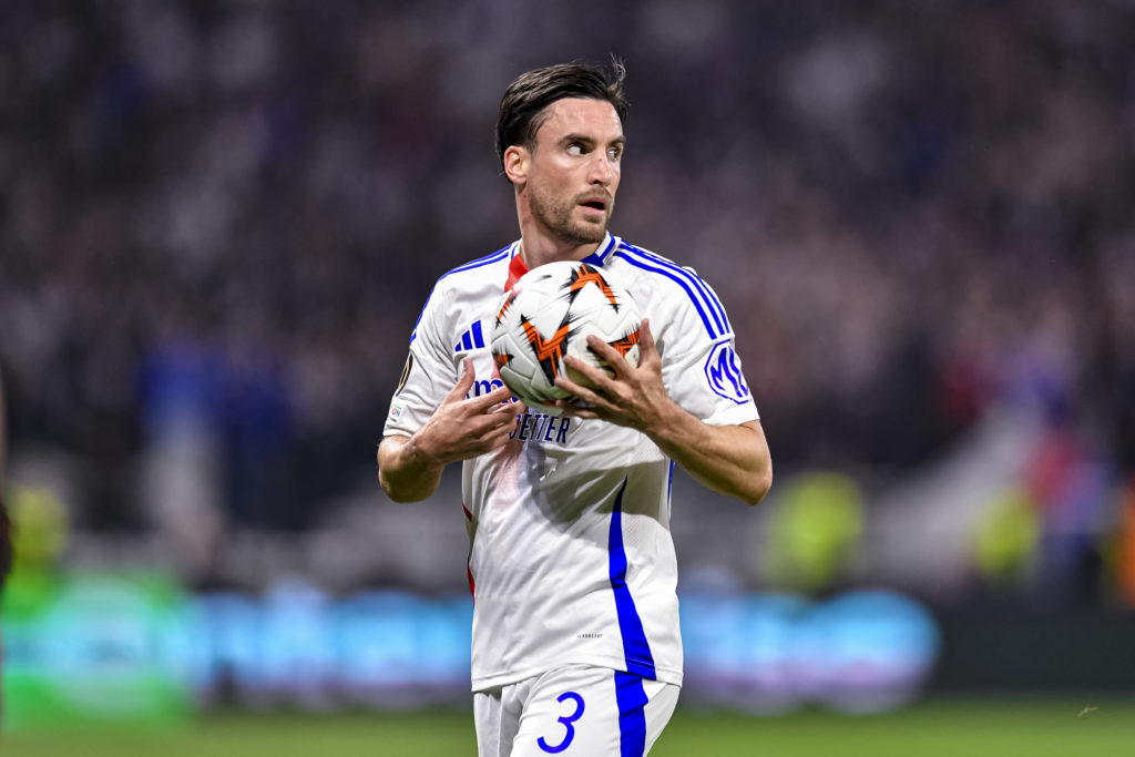 Nicolas Tagliafico holds the ball during Olympique Lyonnais v Manchester United.