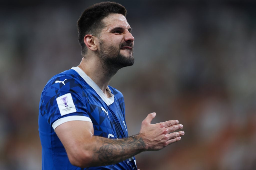 Al-Hilal striker Alexander Mitrovic celebrating.