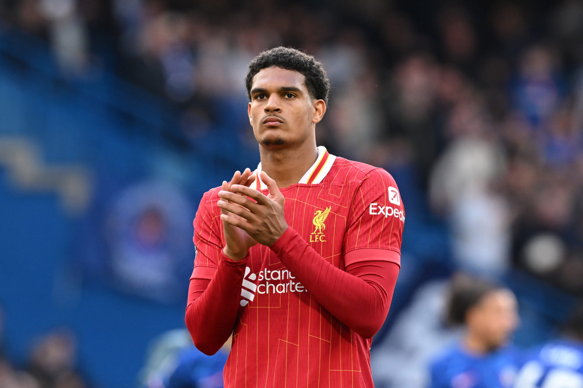 Jarell Quansah applauds the fans after Liverpool's Premier League defeat to Chelsea.