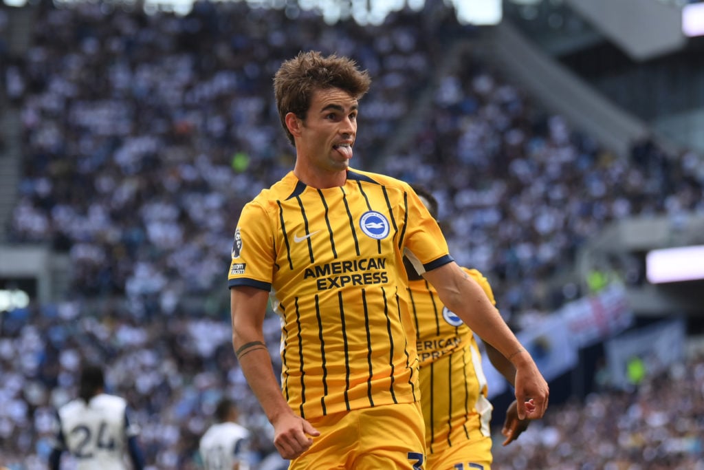 Matt O'Riley sticks his tongue out for Brighton against Tottenham Hotspur.