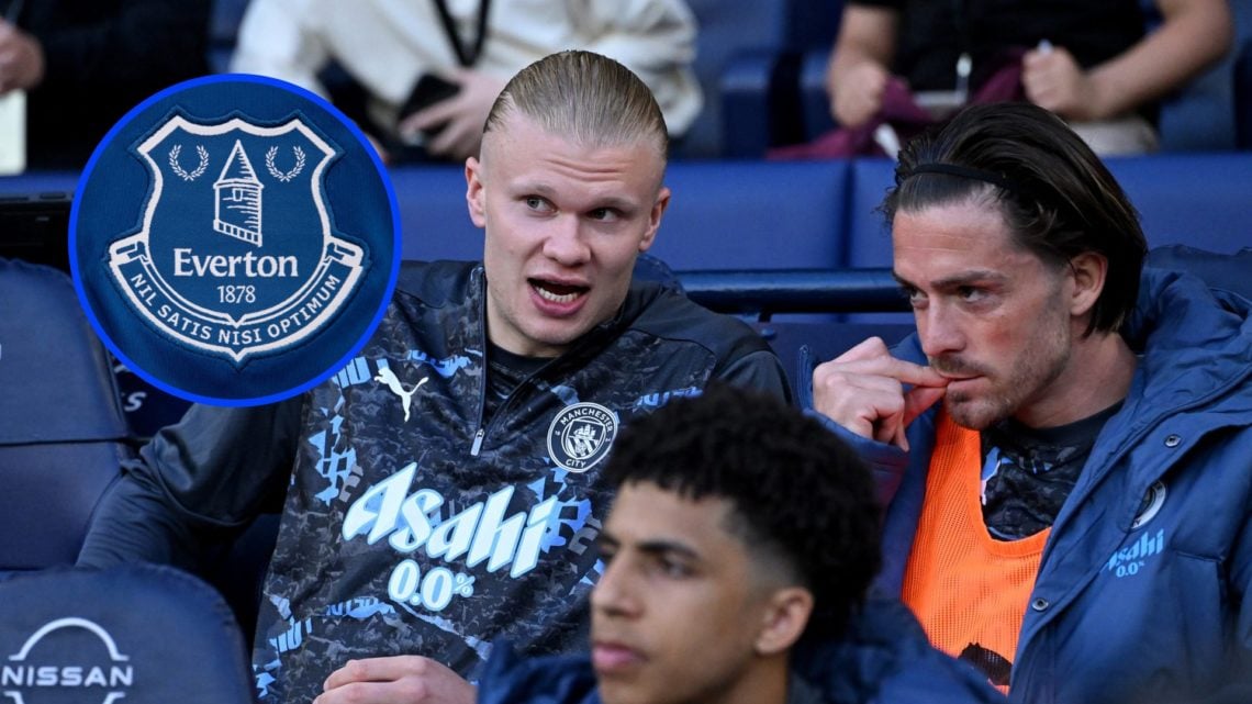 Erling Haaland and Jack Grealish talk on the Manchester City bench ahead of their Premier League game against Wolves.