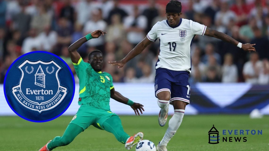 Idrissa Gana Gueye slide tackles England's Noni Madueke for Senegal.