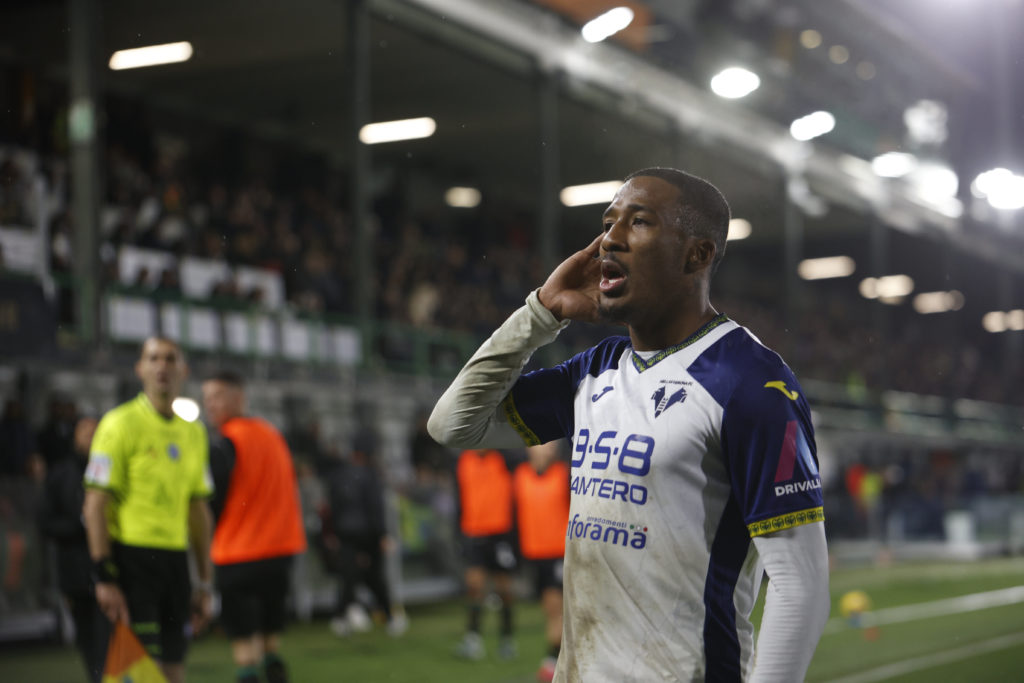 Jackson Tchatchoua celebrates after scoring for Hellas Verona.