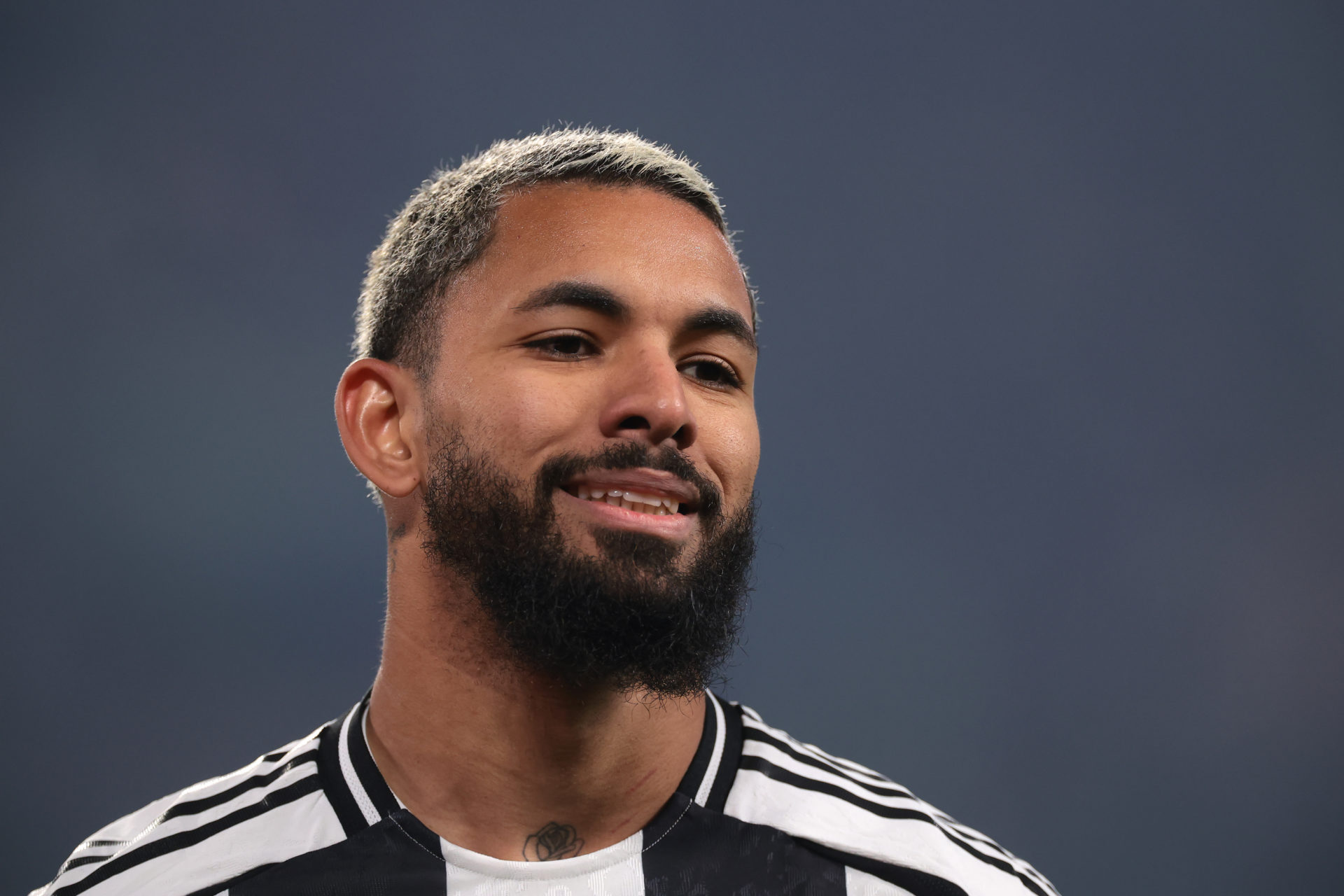 Douglas Luiz is all smiles for Juventus.
