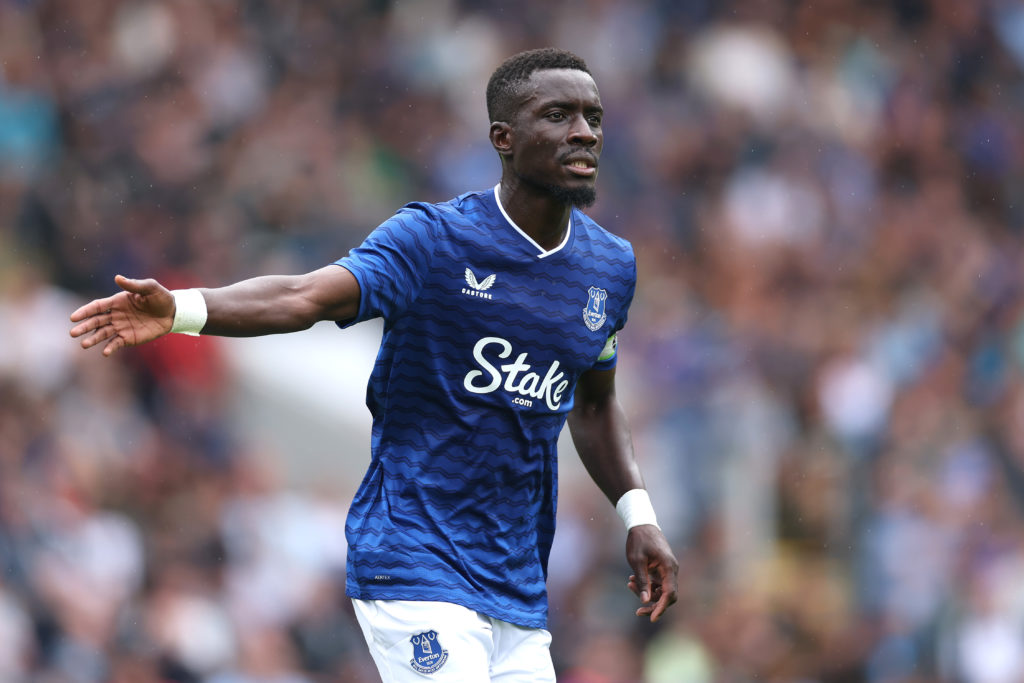 Idrissa Gana Gueye gestures while playing for Everton.
