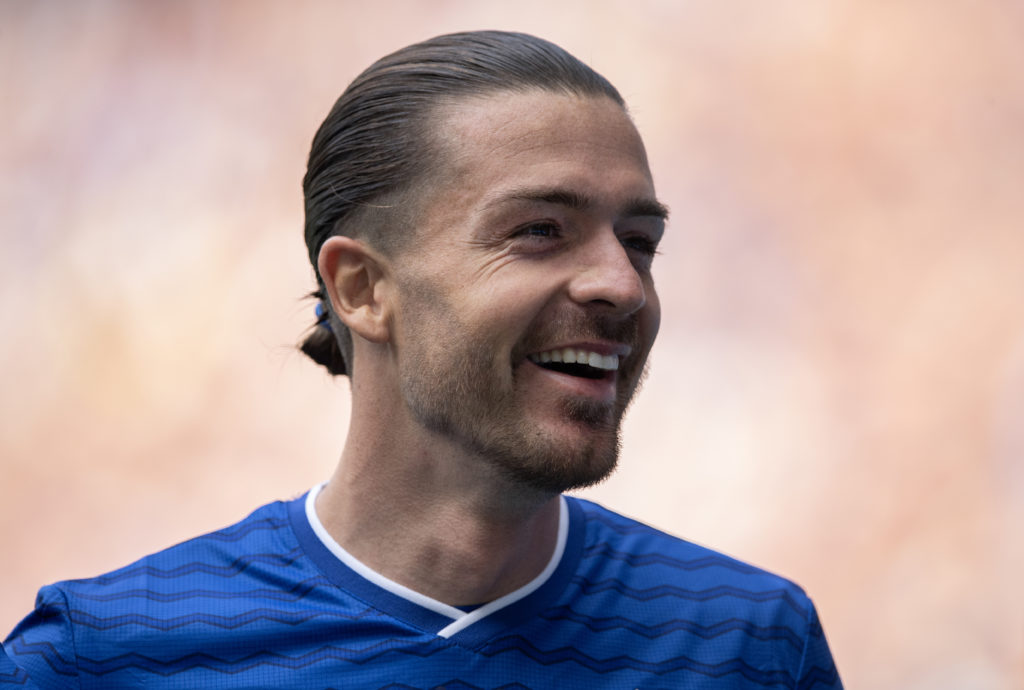 Jack Grealish laughing whilst playing for Everton.