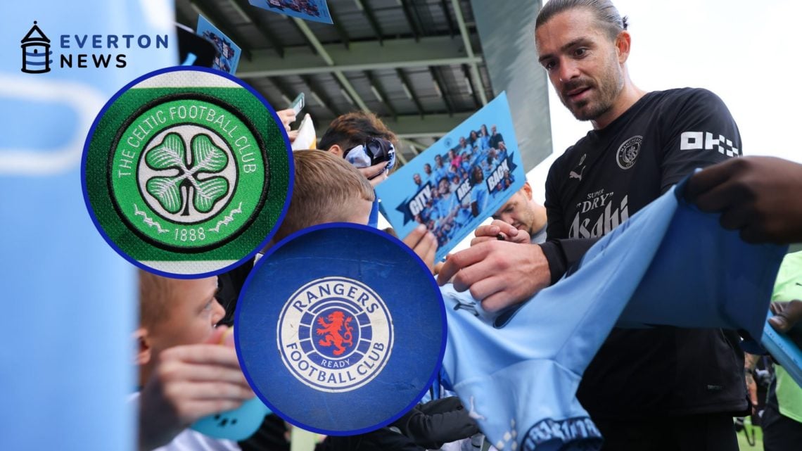 Jack Grealish signs autographs at an open training session for Manchester City.