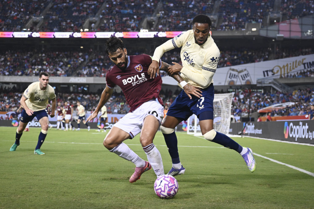 Everton's Youssef Chermiti challenges for the ball.