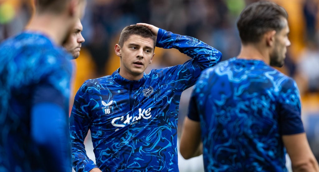 Vitaliy Mykolenko warming up for Everton.