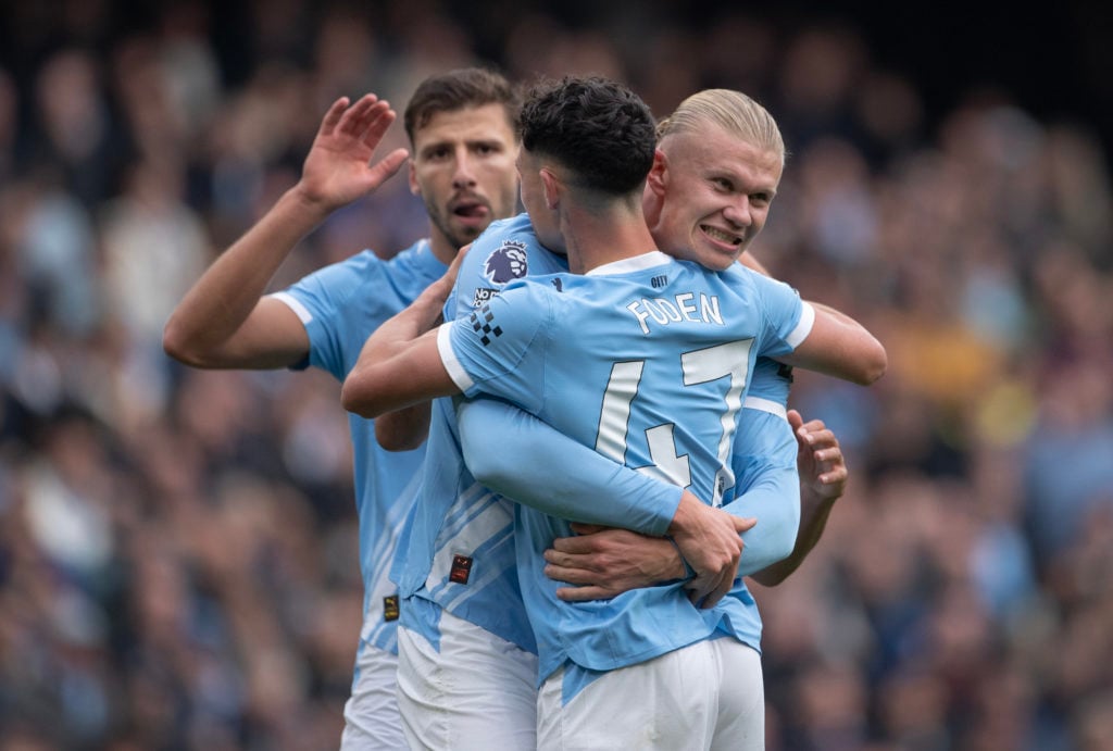 Manchester City trio Ruben Dias, Phil Foden and Erling Haaland.