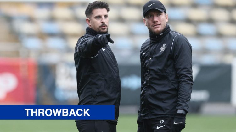 Union Saint-Gilloise coach Kevin Mirallas speaks to manager Sebastien Pocognoli. Inset, a red banner with 'throwback' in white text.