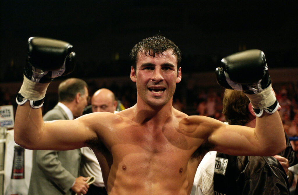 Joe Calzaghe of Wales celebrates after winning
