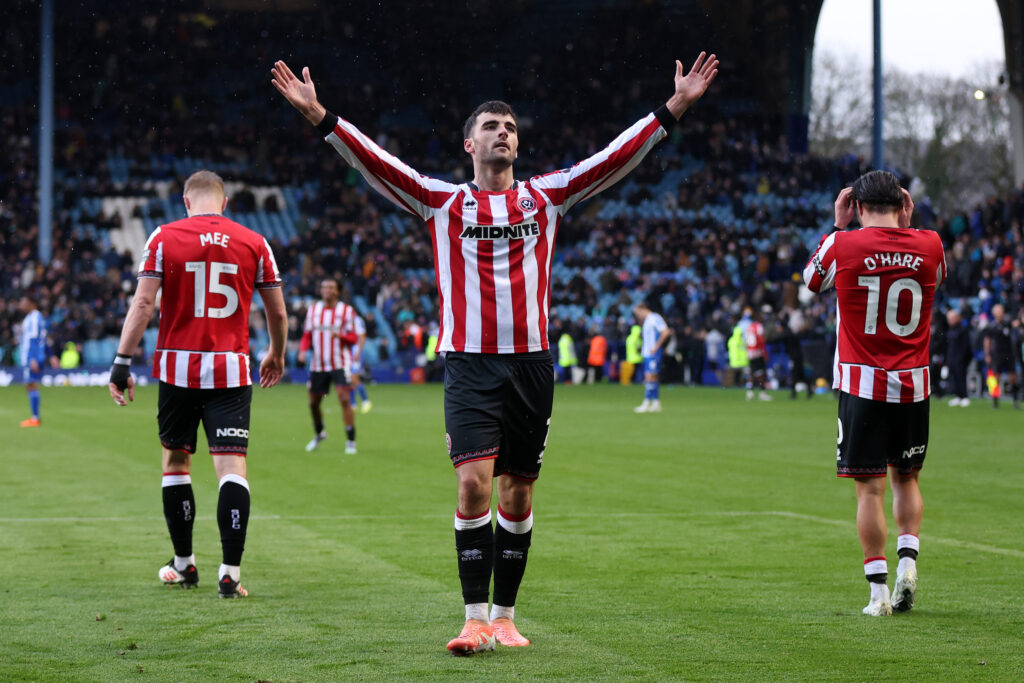 Sheffield United striker Tom Cannon celebrating against Sheffield Wednesday.