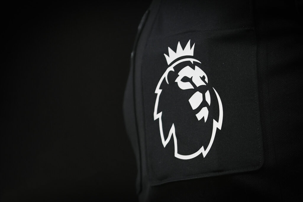 Up-close look at the Premier League logo on a black background