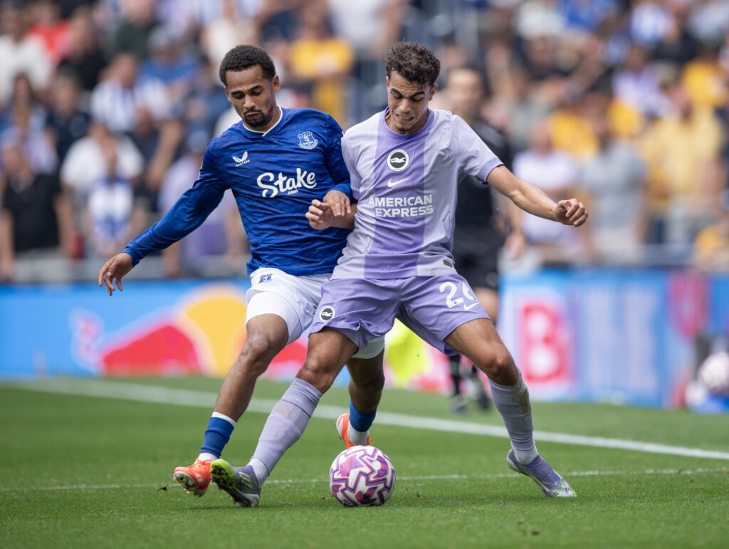 Iliman Ndiaye fights for the ball for Everton