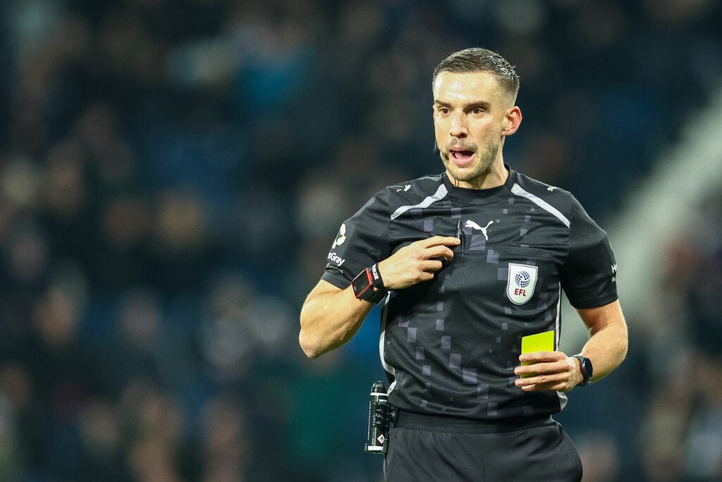 Referee Thomas Kirk.