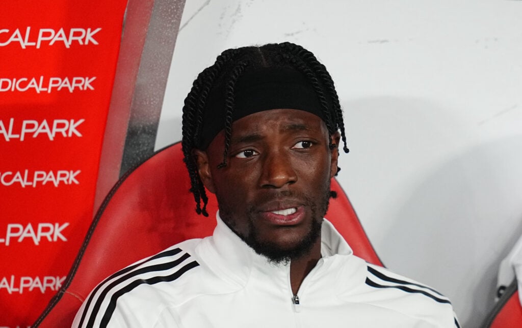 Tammy Abraham sits on the Besiktas bench.