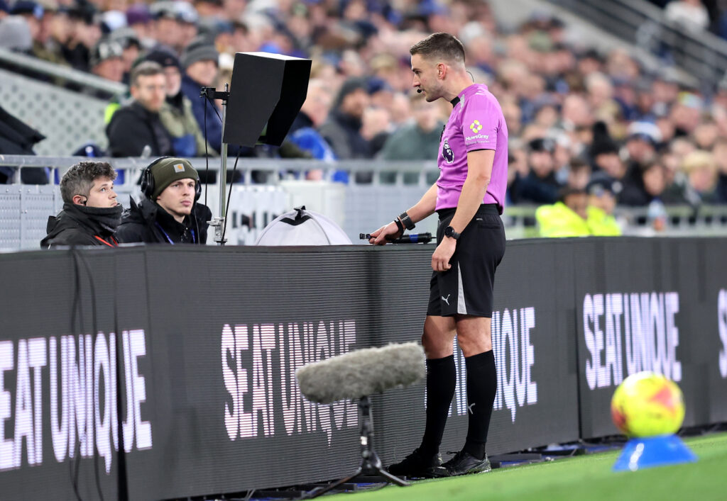 Thomas Kirk checks the VAR monitor during Everton 1-1 Wolves