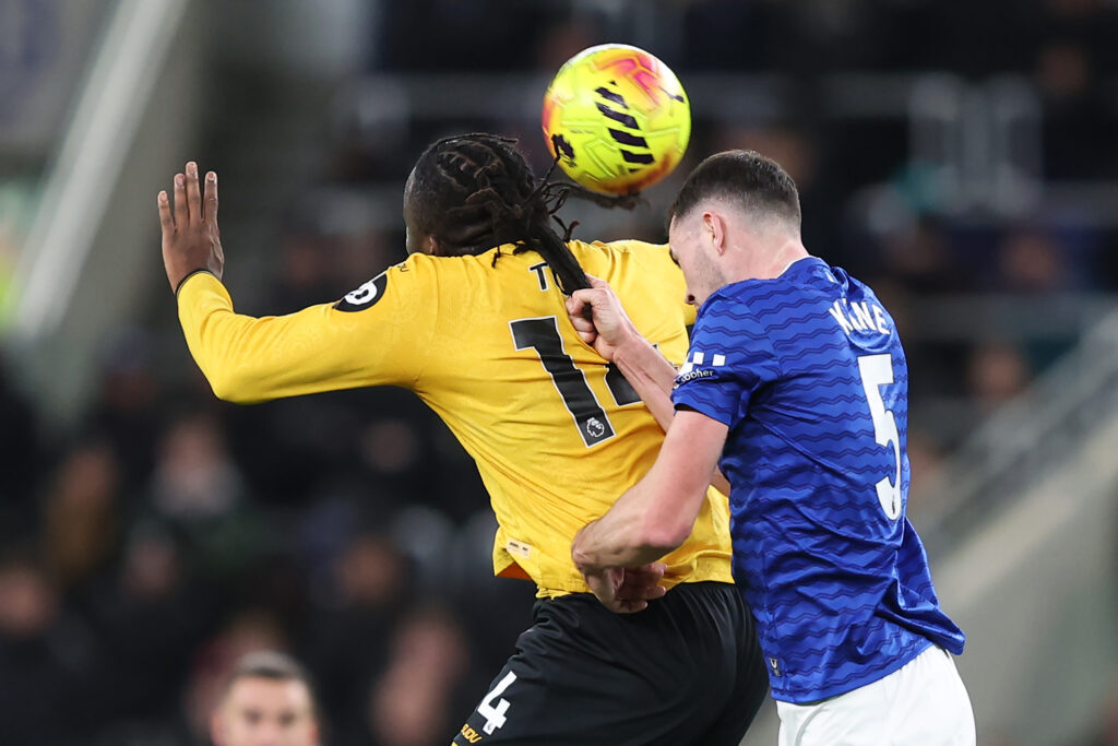 Michael Keane pulls Tolu Arokodare's hair during Everton vs Wolves.