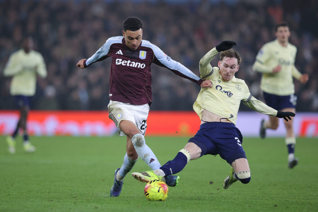 James Garner makes a slide tackle against Aston Villa.