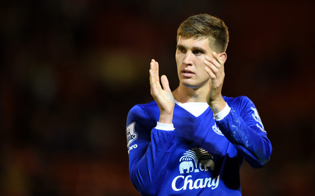 John Stones claps fans.