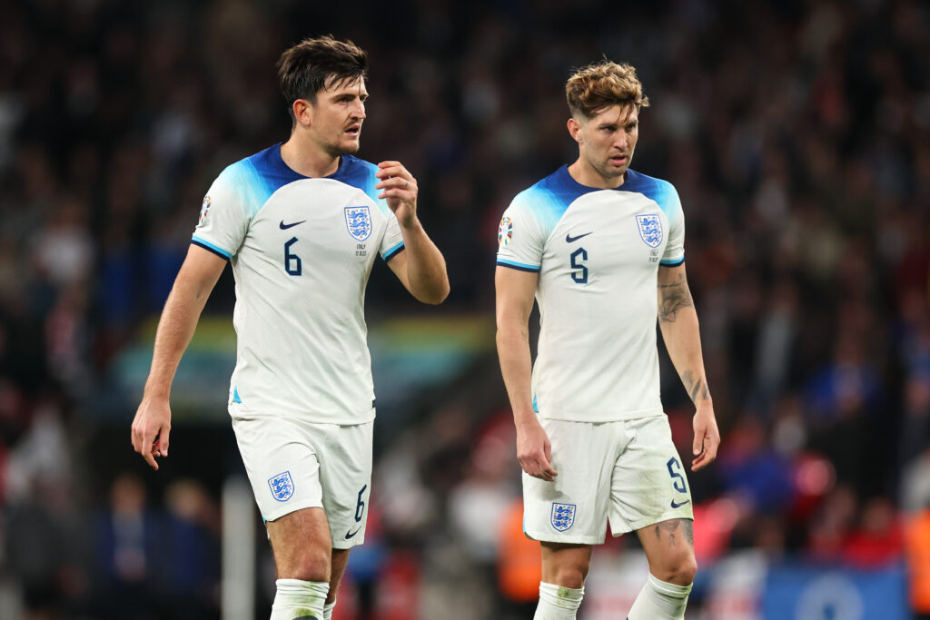 Harry Maguire and John Stones playing for England together.