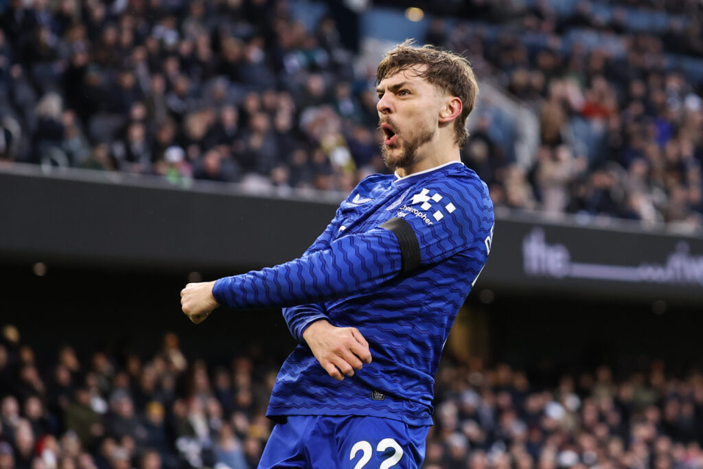 Kiernan Dewsbury-Hall celebrates scoring for Everton.