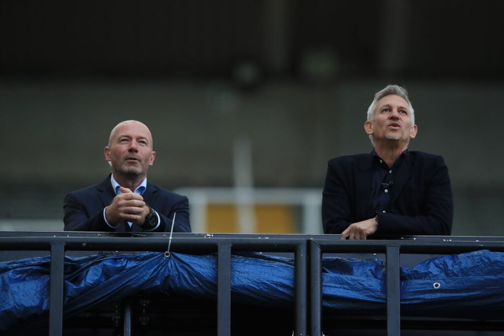 Gary Lineker and Alan Shearer look on.
