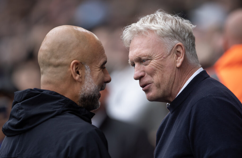 Pep Guardiola and David Moyes in conversation.