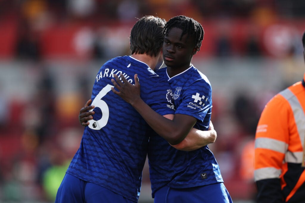 Tyrique George embraces James Tarkowski for Everton.