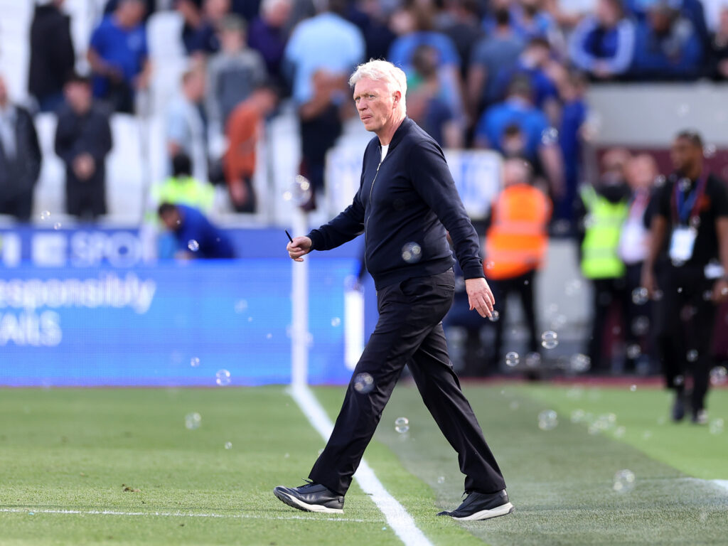 David Moyes walks onto the pitch.