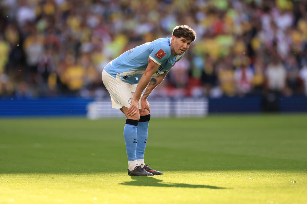 John Stones playing for Manchester City.