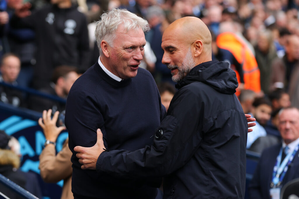 David Moyes shakes hands with Pep Guardiola.