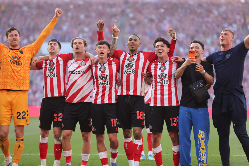 Sunderland players celebrate securing European football.