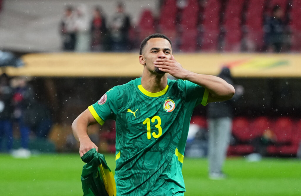 Iliman Ndiaye blows a kiss.