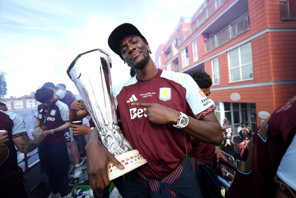 Tammy Abraham holds the Europa League trophy.