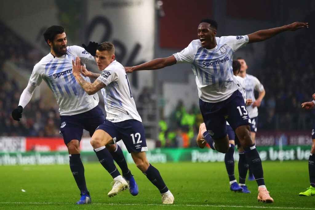 Andre Gomes, Yerry Mina and Lucas Digne celebrate for Everton.