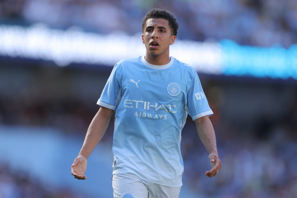 Rico Lewis playing for Manchester City.